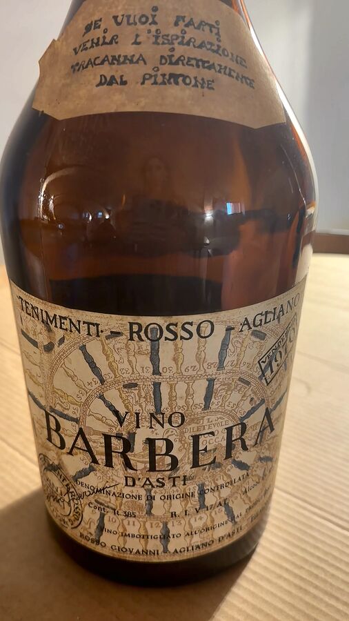An old bottle of Vino Barbera d'Asti from the Rosso family
